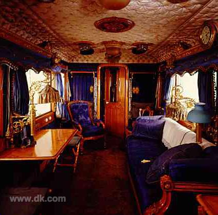 50016594.jpg - Queen Victoria’s day coach Built in 1869, Queen Victoria’s coach had furniture in bird’s-eye maple, upholstery in blue watered silk, and ceilings in white quilted silk.